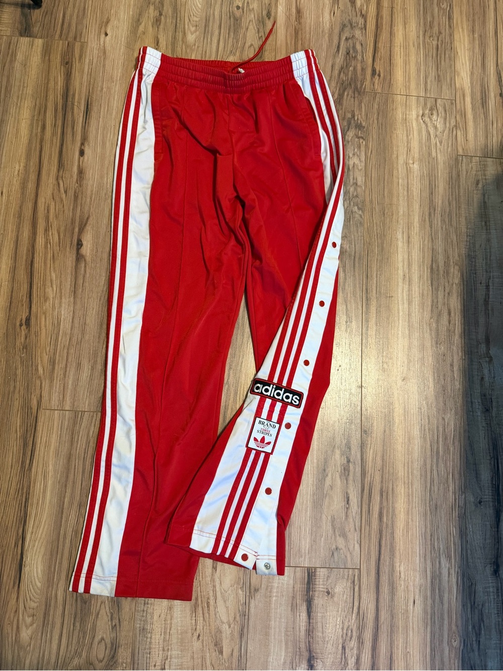 adidas Red women’s Track Pants with White Side Stripes